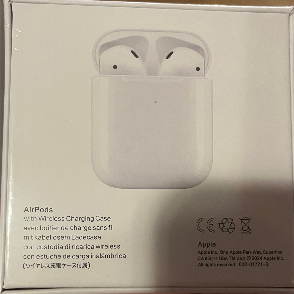 Apple AirPods with Charging Case - White